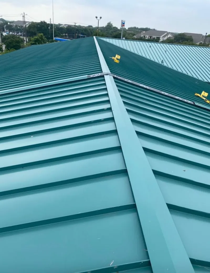 Green commercial metal roof ridge and valley for Metal Roof Repair in Chaska